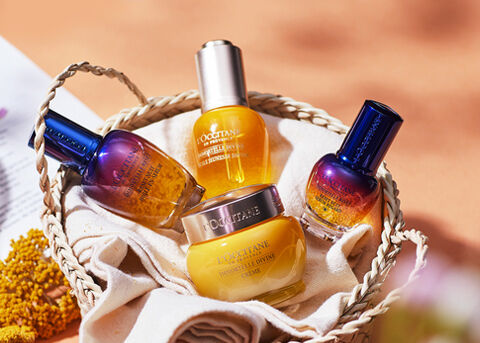 L'Occitane face serums and Divine Cream laying in a basket
